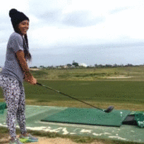 Girl attempts a Happy Gilmore golf shot