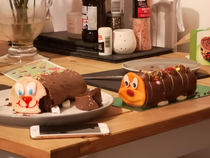 Girlfriend tried to make me a caterpillar cake for my birthday Ended up buying one after making the first because she couldnt remember if she used flour or not