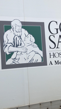 Good Samaritan Hospitals logo looks like David Letterman giving a massage to a buff Martin Short