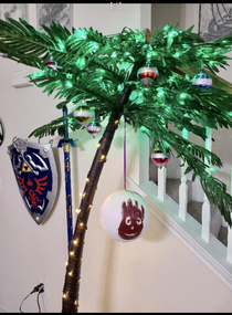 Got my friend a Wilson ball for her palm Christmas tree