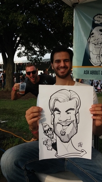 Got photobombed during a caricature