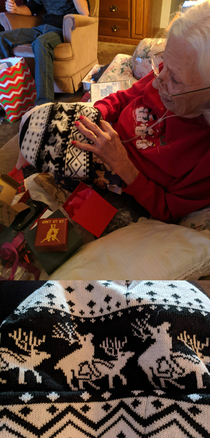 Grandma realizing the cute little reindeer on the beanie she gave me are having a party