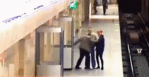 Guy pushes woman onto Moscow subway tracks