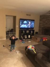 he already has a favorite movie he grabs his hat when i put it on