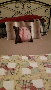 Here is a pillow with my face I mailed to my mom as a joke Turns out it is on the guest bed