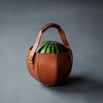 High fashion watermelon leather holster by Tsuchiya Kaban