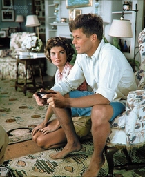 Historical photo Jacqueline Bouvier is beging John Kennedy to buy a second wireless gamepad for the PS