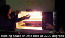 Holding space shuttle tiles at  degrees