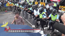 Hong Kong polices spray on an elder protester telling others stop attacking rudely with pepper spray