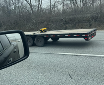 Hope he got the right permits to haul this massive load down the interstate