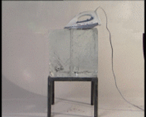 Hot iron melting through ice cube