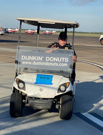Houston Police officer in cart sponsored by Dunkin Doughnuts Seen today at Wings Over Houston airshow