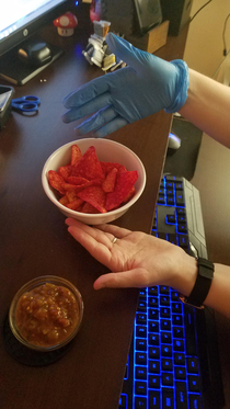 How my wife handles her spicy doritos and salsa snack
