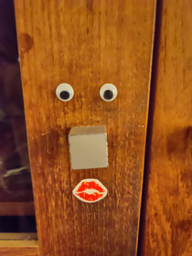 I added googly eyes to a closet came home to see my mom added a mouth