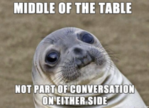 I always have this grand idea that sitting in the middle will put me in the center of the conversation