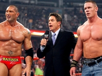 I can see Cena but I feel as though theres another dude that is standing so incredibly still