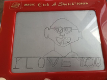 I drew my wife on an Etch A Sketch she has hair but it would take too long to draw
