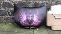 I found an abandoned car bonnet with a painted Hugh Jackman sitting outside my flat
