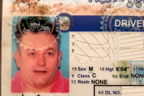 I have a long-standing battle with my buddy for the most ridiculous photo ID My wife suggested I wear my mothers hot pink bathrobe and Gary Busey my hair for my new DRIVERS LICENSE photo so I did