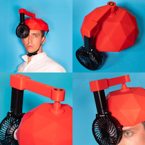 I like to design stupid products for fun so I made a helmet with a spinning arm fan for when something really smells