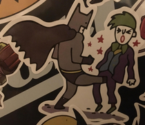 I ordered a bunch of generic superhero stickers and one of them is just Batman kicking The Joker in the nuts