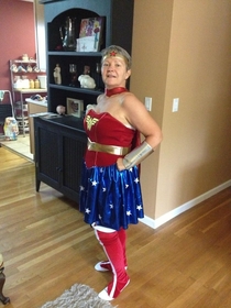 I ordered a Wonder Woman costume online It was a little big for me when it arrived and my grandmother said she wanted to try it on This is the fabulous result 