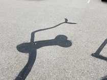 I really doubt the crack in the asphalt is that shape