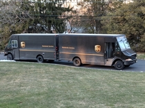 I stumbled across the rarely documented mating ritual of UPS trucks in front of my house