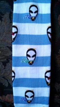 I thought the Christmas Angel Alien socks were sweet until I realized I was holing them upside down