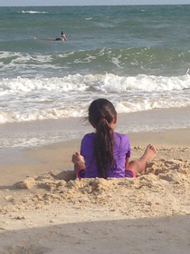 I took a picture of my daughter playing in the sand my husband floatobombed