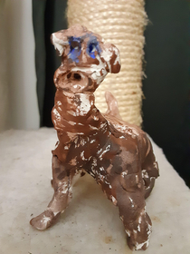 I was digging through some junk and found an old clay dog I made in elementary school