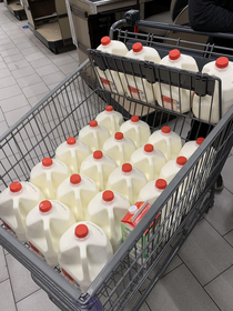 If a man at a grocery store buys  gallons of whole milk and a half gallon of soy milk how many math books will ask him for rights to use him in their problems