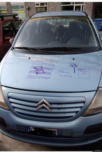 In italy Someone made a little sketch on the car parked on the pedestrian crossing in order to explain to the driver the error he made