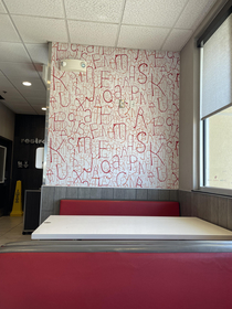 Is this McDonalds doing a terrifying Riddler themed decor