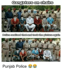 Its a tradition for Indian police to pose with the culprits they caught Someone overthought and got chairs for the culprits making them look like accomplice 