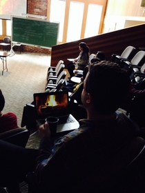 Its dumping snow here This guy shows up to class with a mug hot coco and sits in class watching the yule log video all class long