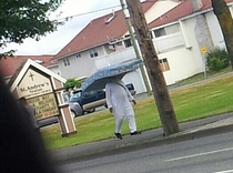 Just a man with a mattress on his head