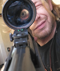 Just once Id like to see a movie where the person peering through the scope looks realistic 