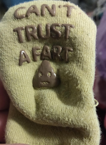 Just realized my baby has socks that say this
