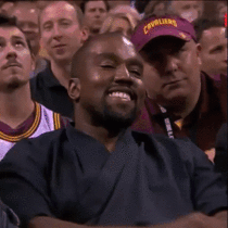 Kanye West caught smiling once again