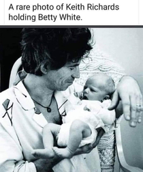 Keith Richards holding Betty White