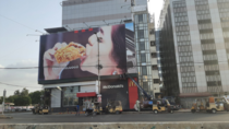 KFC puts up a huge advert on one of McDonalds most recognizable outlets in Karachi Pakistan