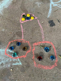 Kid drew a monster on the driveway