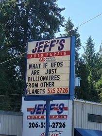 Local mechanic always with something funny on sign