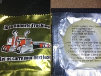 Local trucking company uses condoms as business card