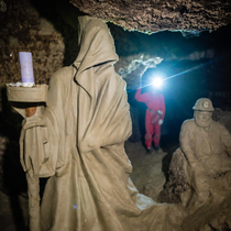 m deep while exploring the Optimistic Cave in Ukraine I find these statues