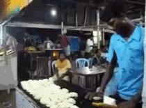 Making chapati bread in India