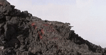 Man runs up lava flow