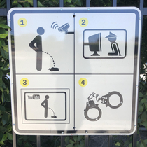 Man This sign on the gates for this business are top notch  Pee on camera  Watch a little porn in a Village People inspired hat  Upload yourself peeing to YouTube  Get kinky
