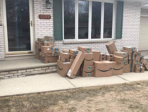 Mans wife saves all her Amazon purchase boxes from the past  years to place on her porch for her husband to come home and see this April 